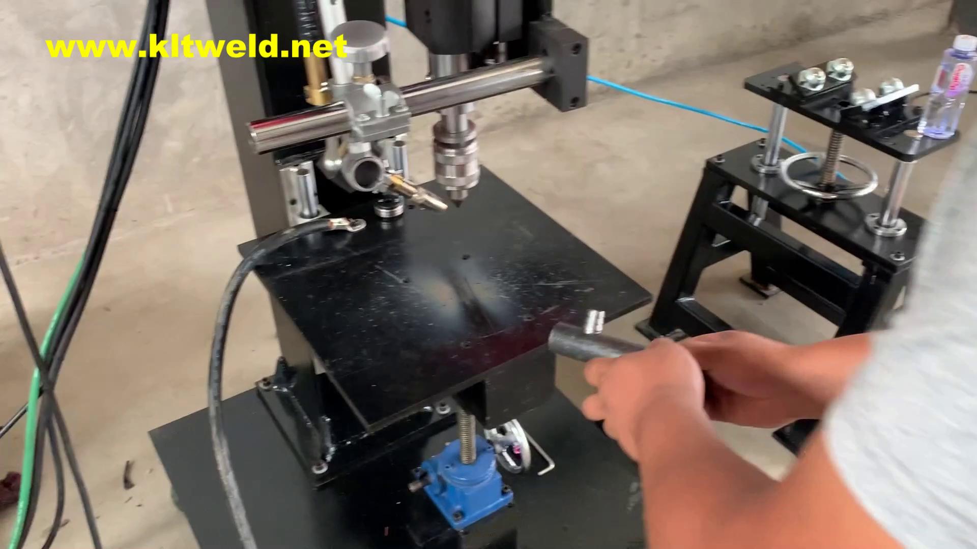 Hydraulic cylinder nut welding machine